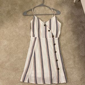 white dress with stripes down it
